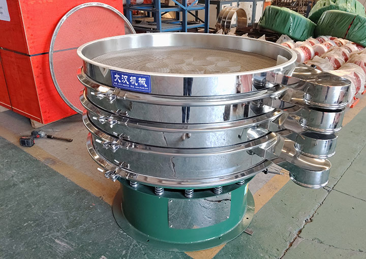 An open stainless steel vibrating screen showing the internal wire mesh, used to compare aperture, wire diameter, and weave type for accurate mesh selection.