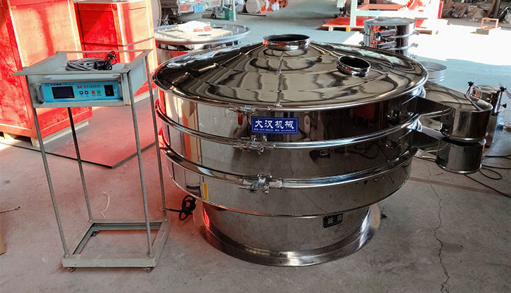 Stainless steel circular vibrating screen machine with a control panel for industrial diamond screening.